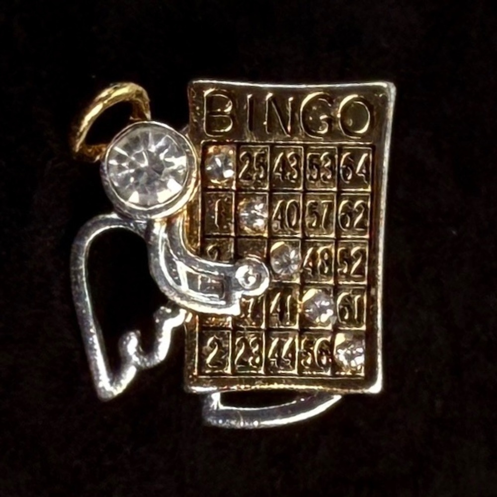 Vintage Silvertone and Goldtone laying Angel playing bingo brooch pin